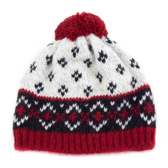 Knitted wool hat with pattern and pom pom, white